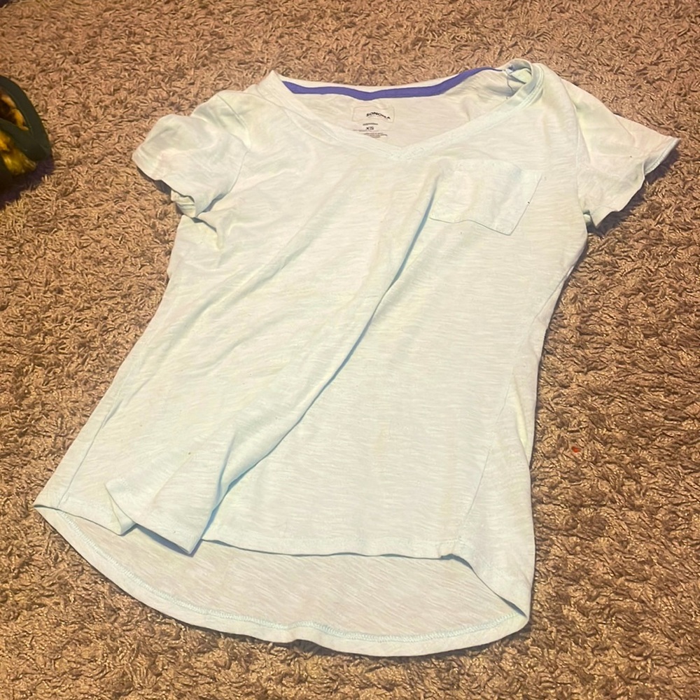 Plain light blue t-shirt with front pocket